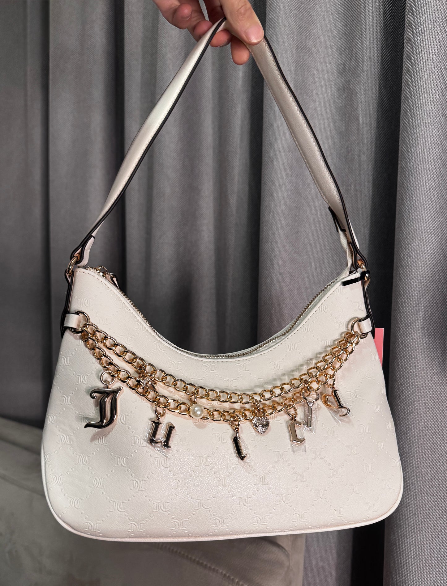 Cartera Juicy Couture Hobo Blanca con Charms