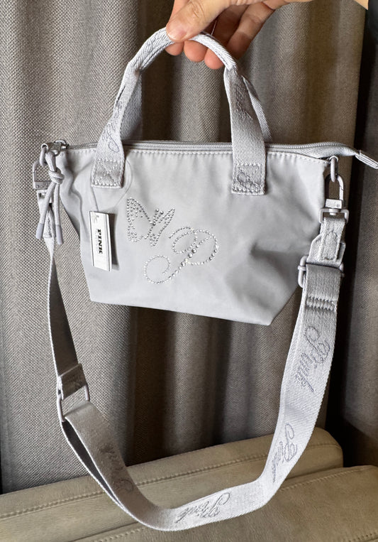 Cartera de mano y crossbody Pink Gris